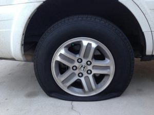 A flat tyre suggesting it has a slow puncture